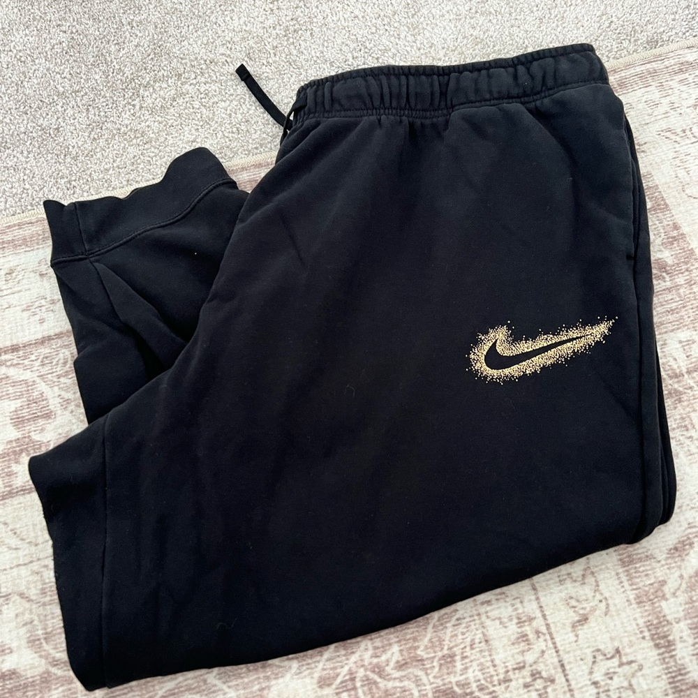 Nike Black and Gold joggers with Relaxed Fit